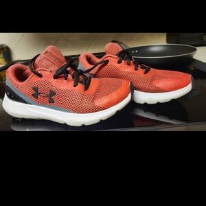 Under Armor red boys tennis shoes